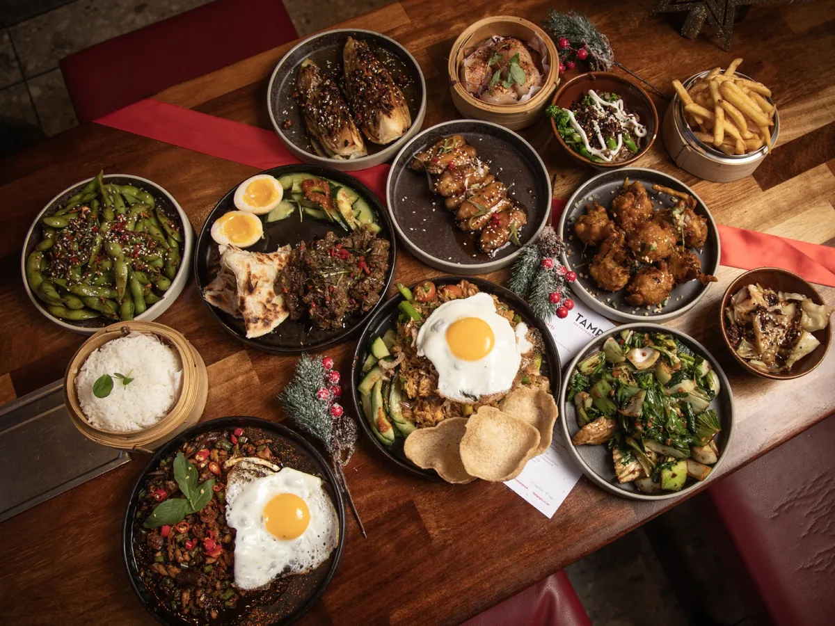 A table of Asian street food dishes at Tampopo